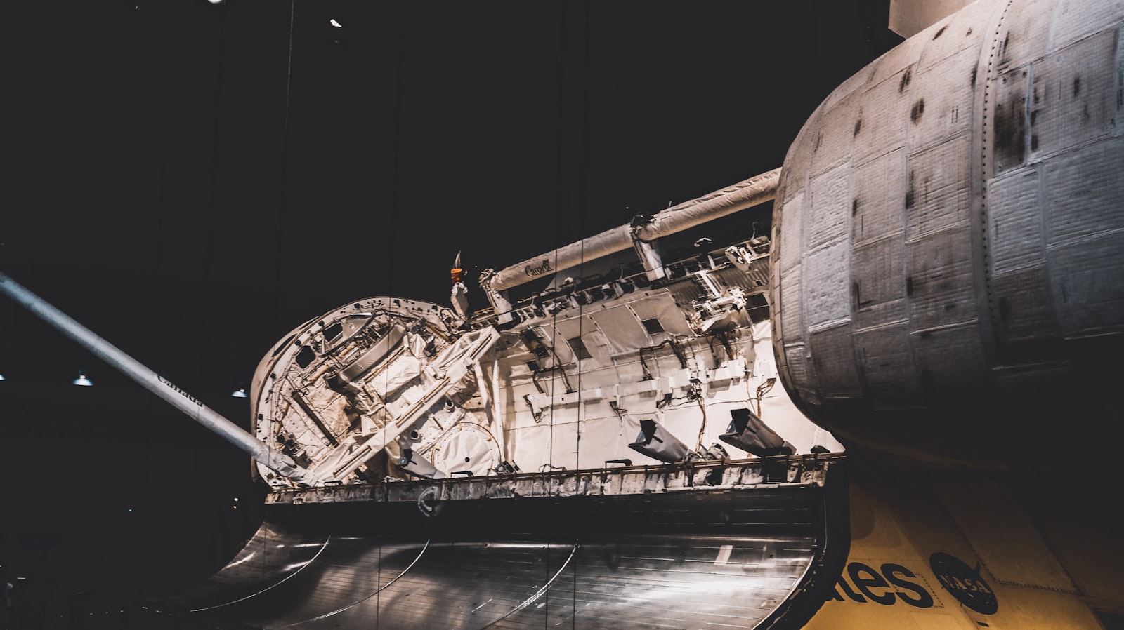 A space station orbiting above the curve of the earth - the over-built thing you do not actually need